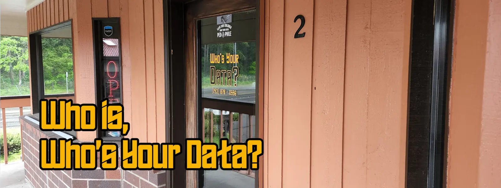Who's Your Data? storefront with company sign